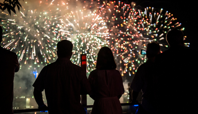 Couple watching fireworks at Red, White and Boom event