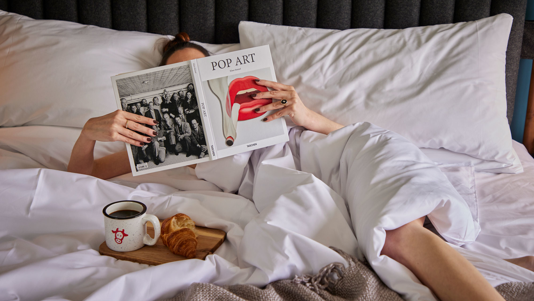 A woman reading in bed
