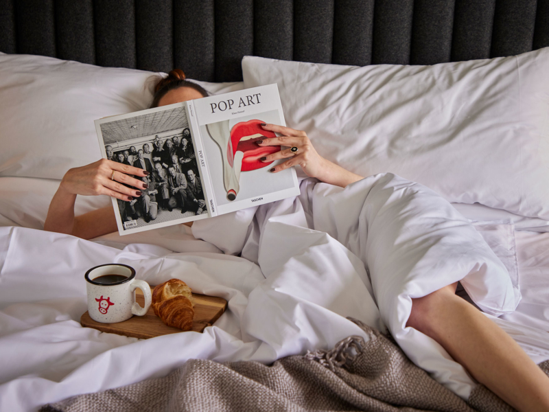 A woman reading in bed