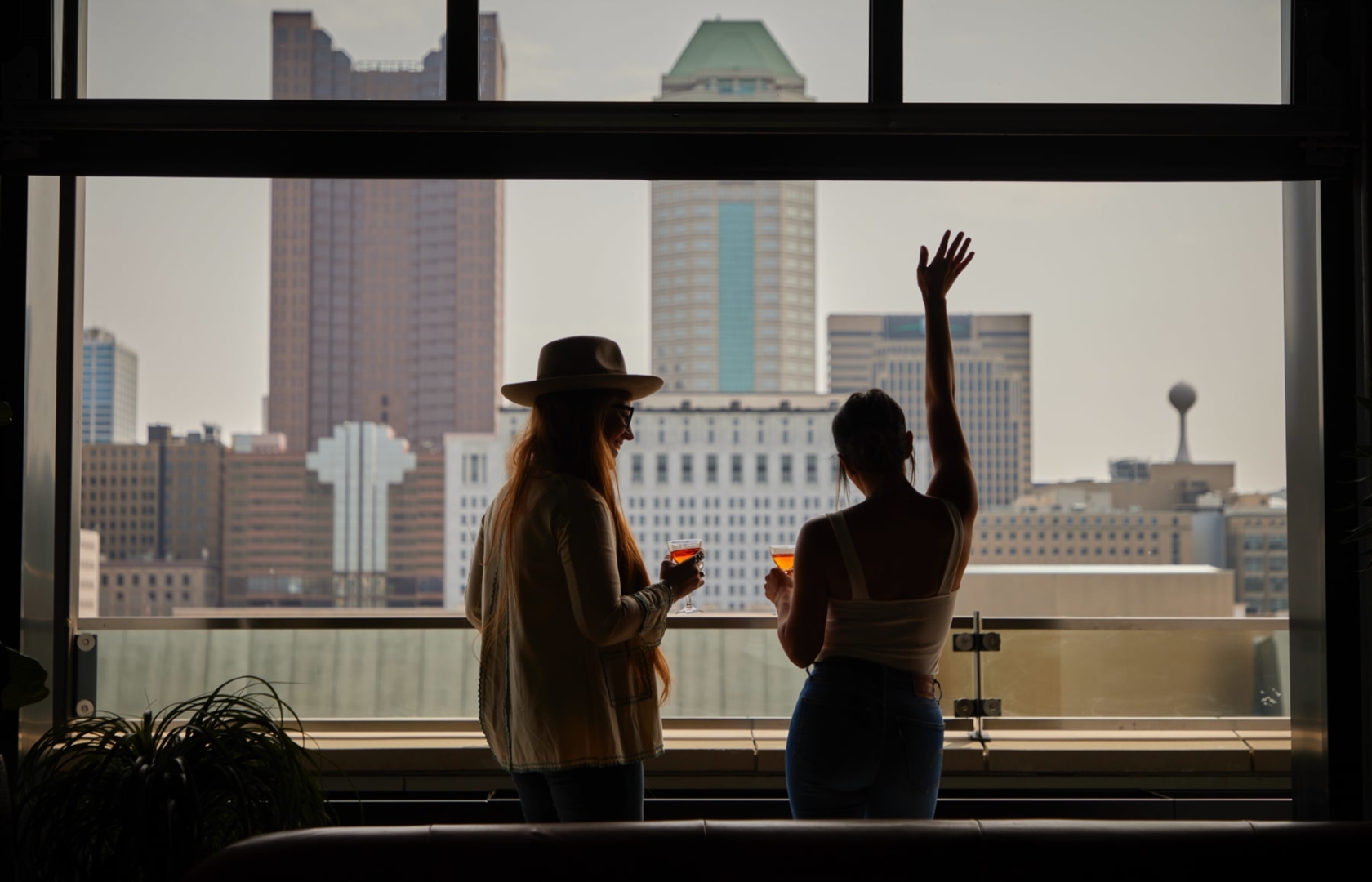 two women looking out at skyline