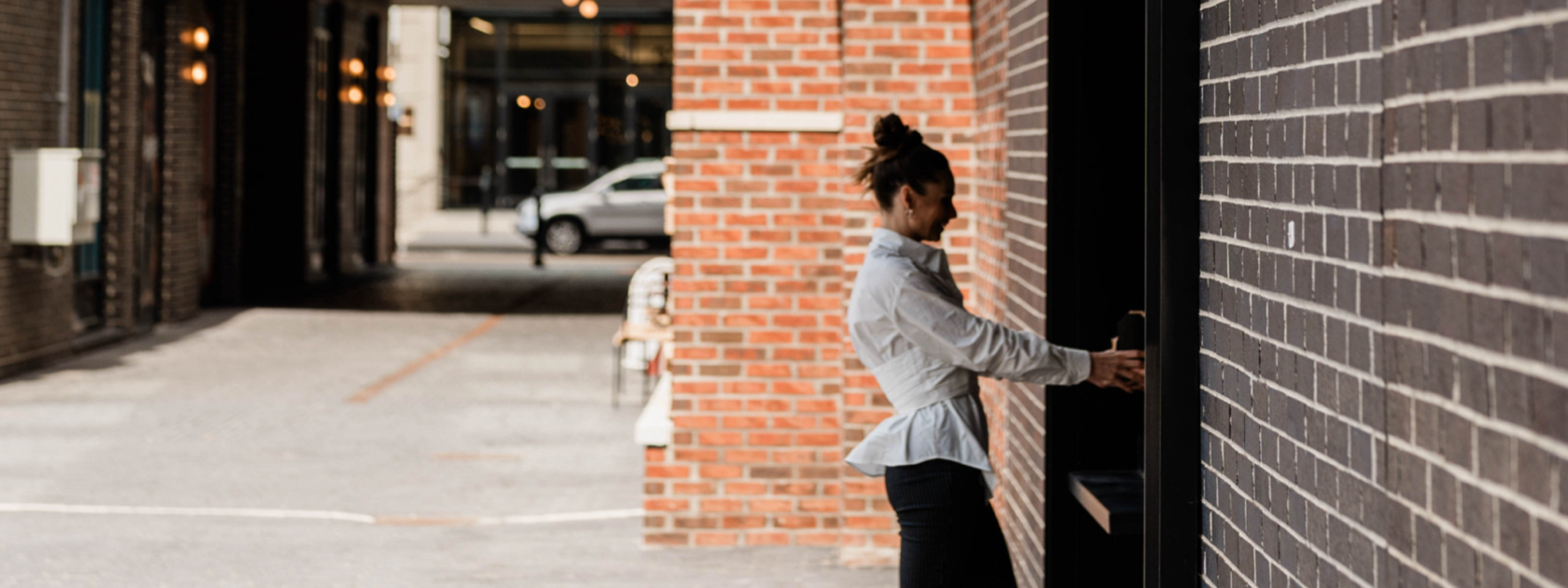 woman standing at food window