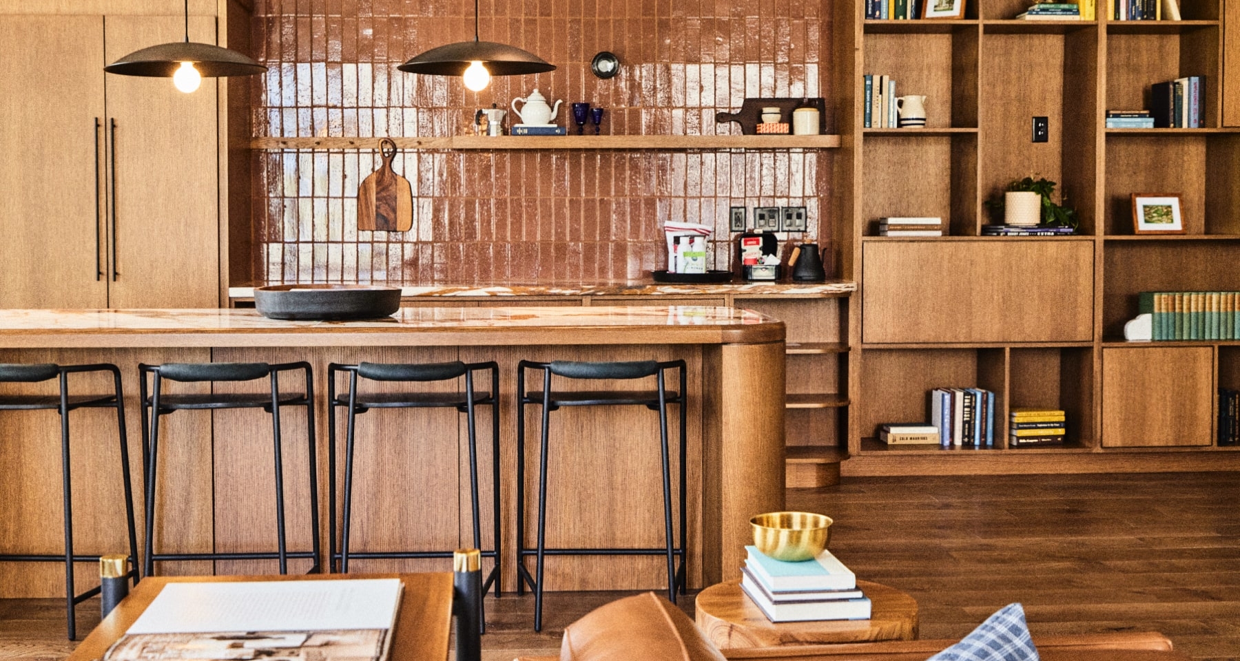 kitchen/bar area with library of books