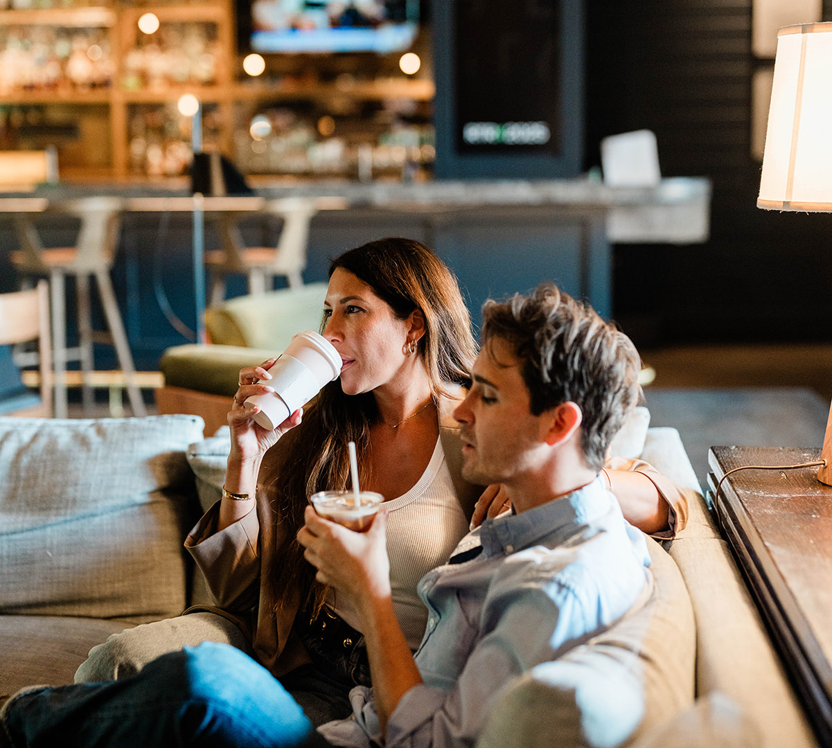 Couple with drinks in Trade Room