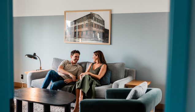 man and woman in guest room