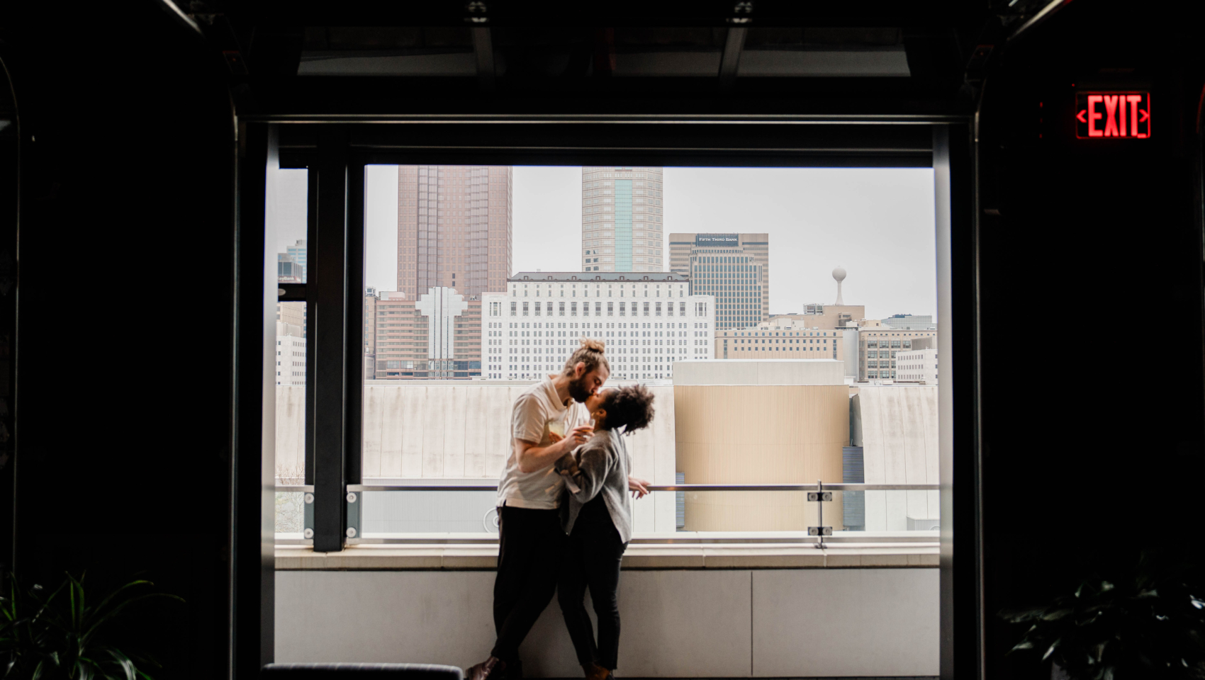 couple kissing at brass eye