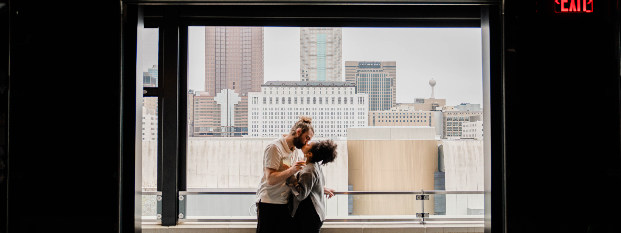 couple kissing at brass eye