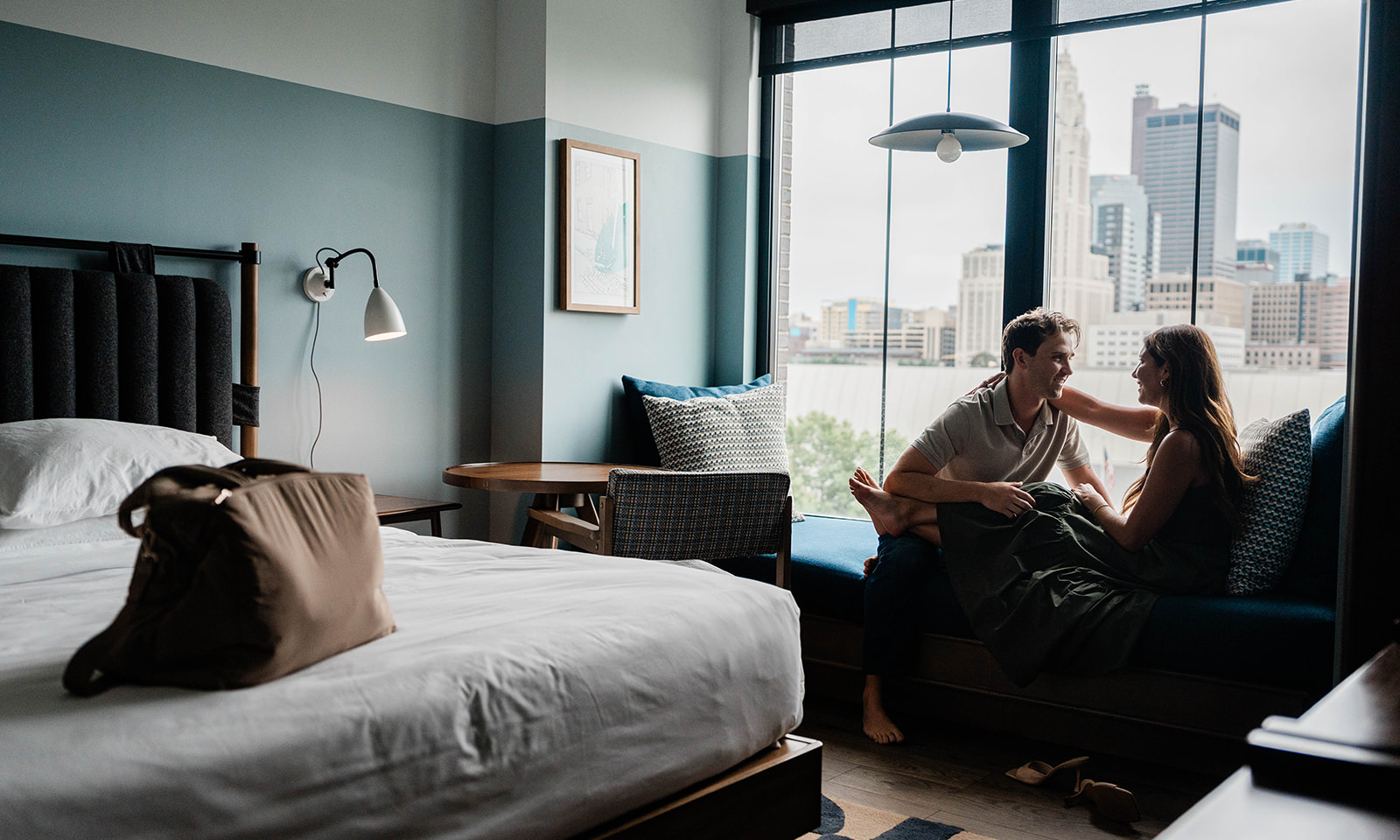 couple sitting on a the day bed