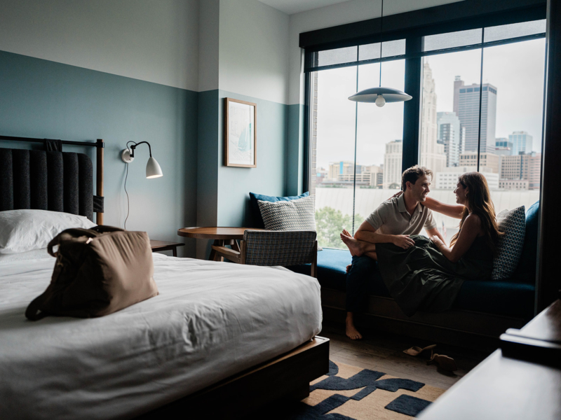couple sitting on a the day bed
